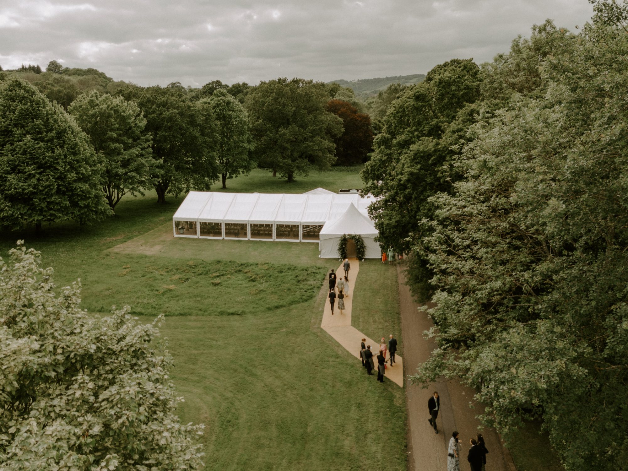 Our marquee in the Surrey parkland, guests arriving